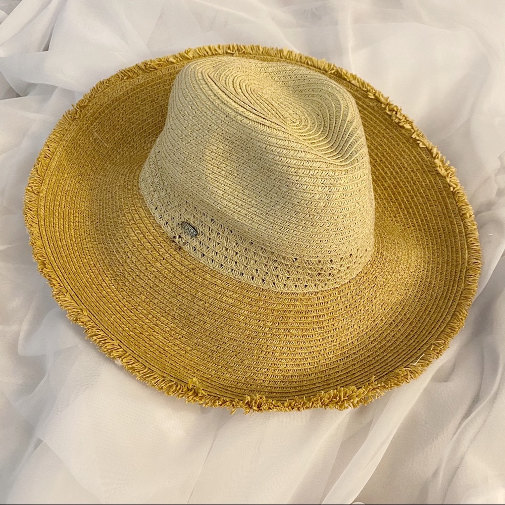 tan woven beach straw hat